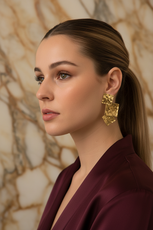 Model Wearing Gold Geometric Square Earrings - Vogue Editorial